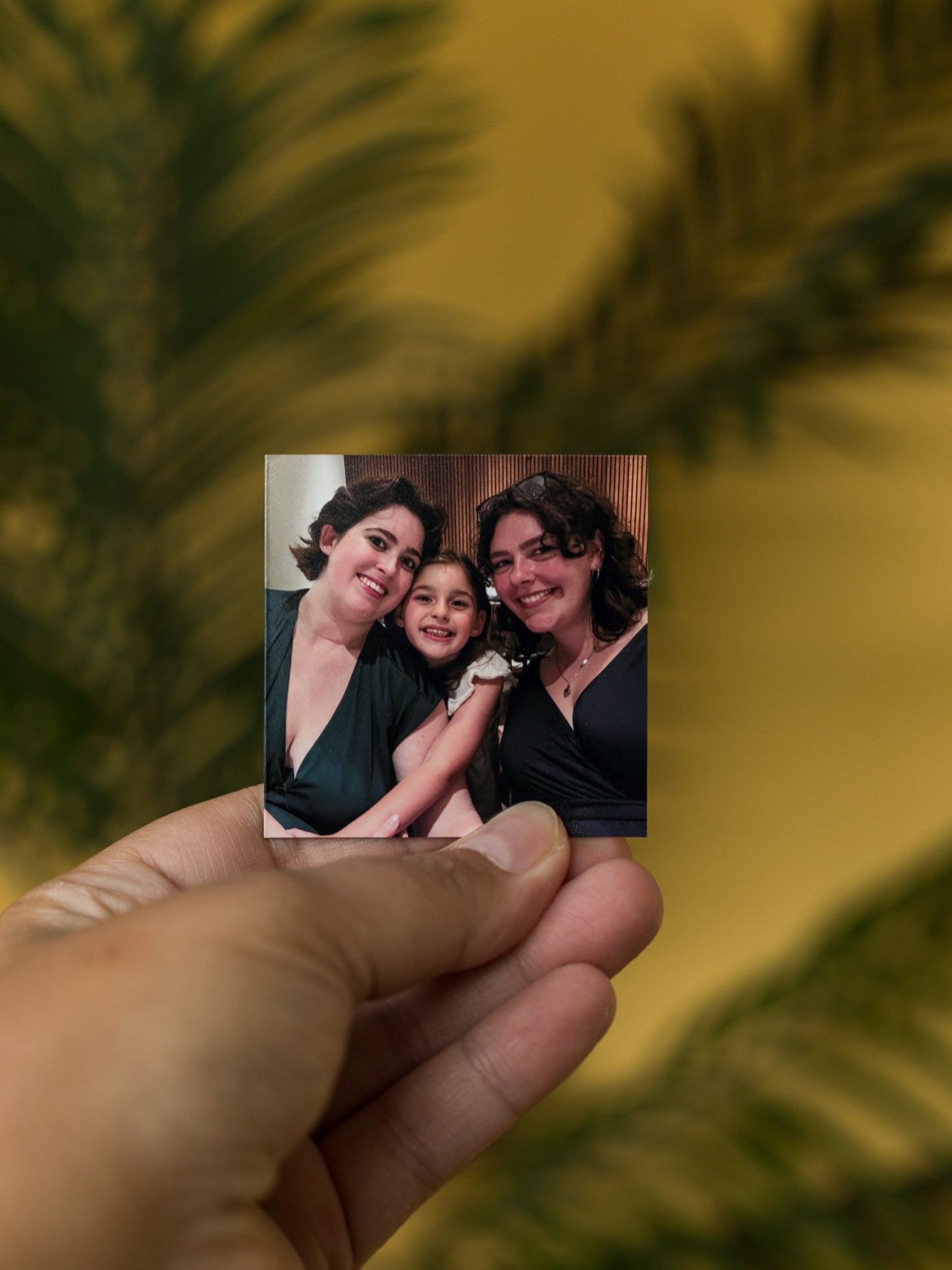 Custom square 3x3 photo magnet of two women and a child.